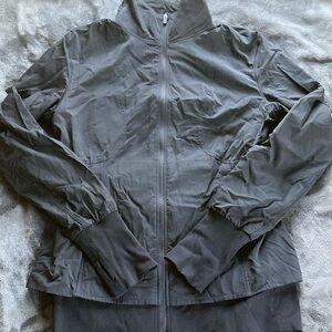 Lululemon full zip jacket. Double layered with ruching  details. Gently worn